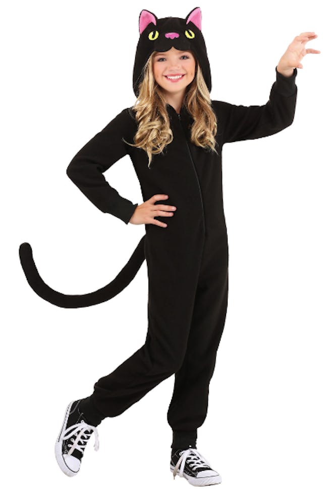 Girl wearing a black cat onesie costume