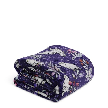 The Vera Bradley X 'Harry Potter' Forbidden Forest Collection features a fleece throw blanket. 