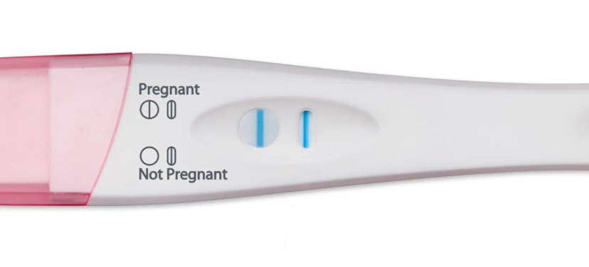 Up close photo of positive pregnancy test