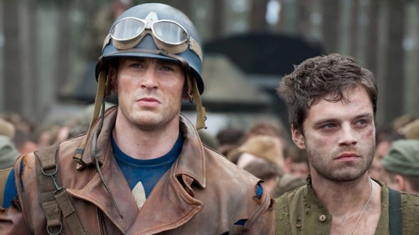 A still from ‘Captain America: The First Avenger,’ with Bucky and Captain America walking into camp …