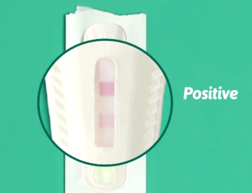 Up close image of positive Lia pregnancy test
