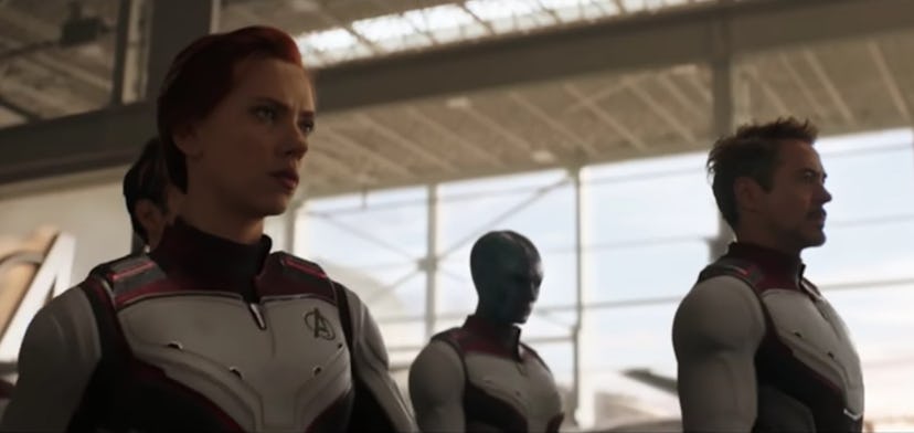 A still from the movie 'Avengers: Endgame," with Black Widow, Nebula, and Iron Man walking.