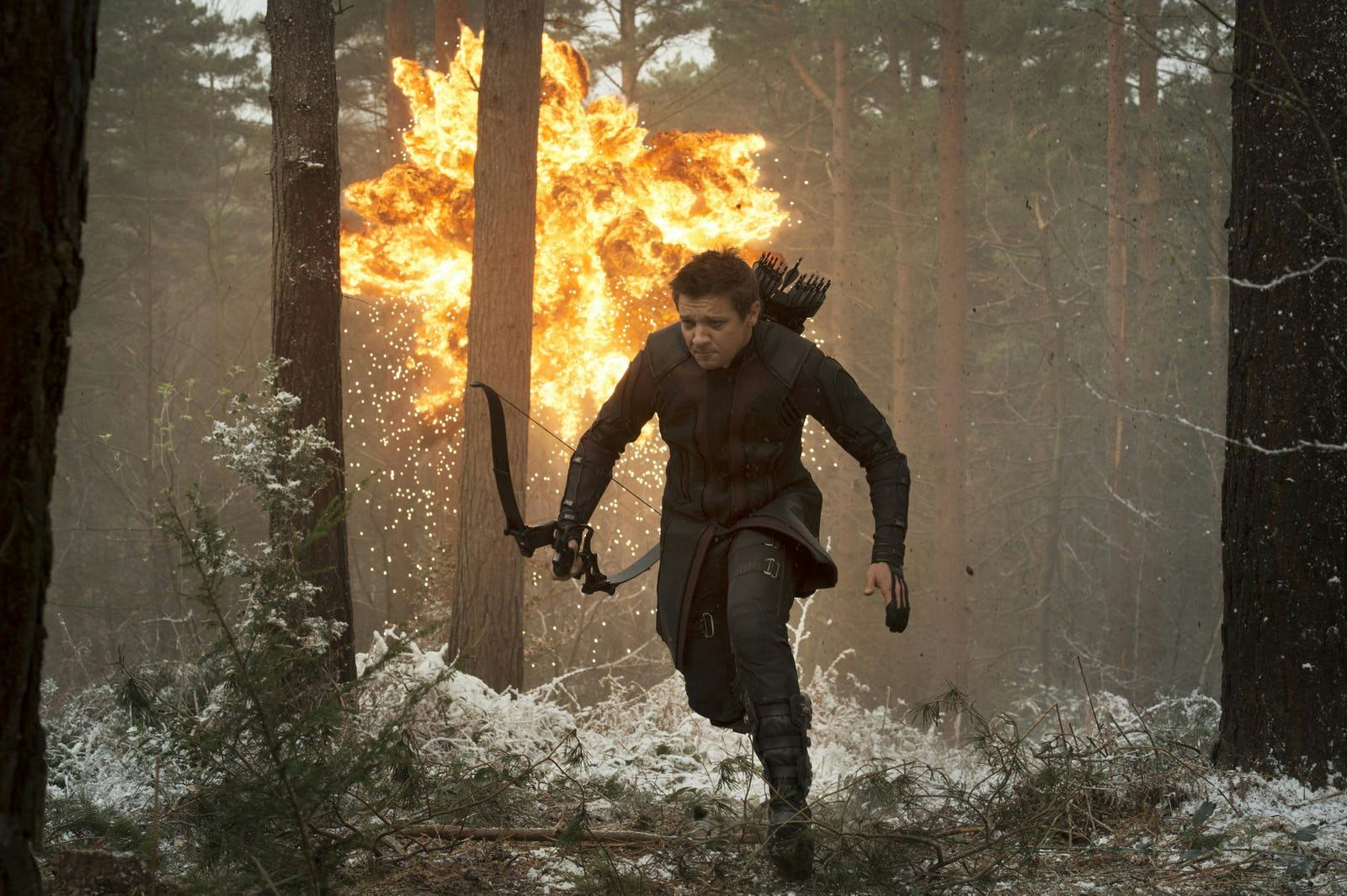 A still from &lsquo;Avengers: Age of Ultron,&rsquo; with Hawkeye running from an explosion in the woods.