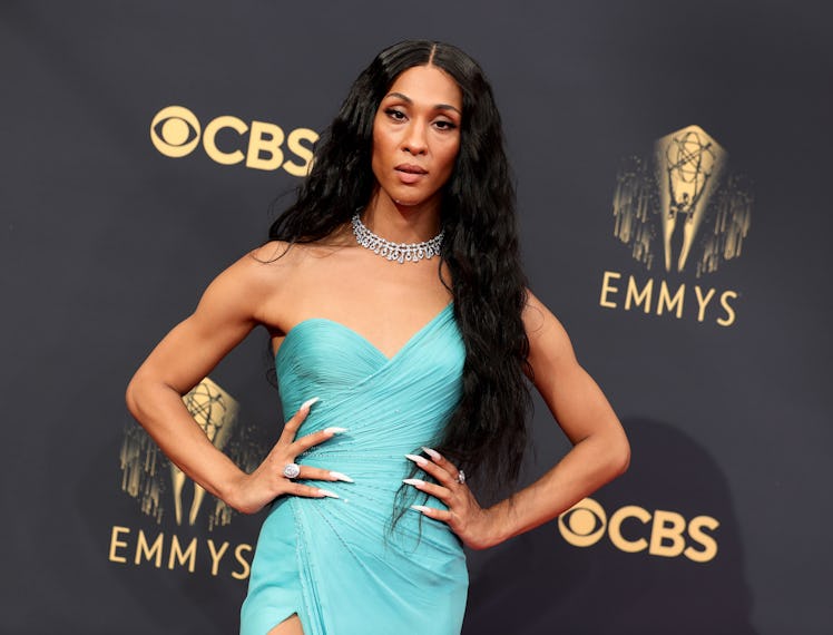 MJ Rodriguez wearing a teal Versace dress with a milky stiletto nail manicure on the Emmys 2021 red ...