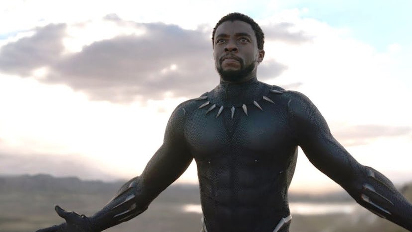 A still from ‘Black Panther,’ with Chadwick Boseman as Black Panther with arms outstretched, ready f…