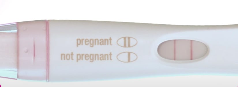 Up close photo of positive pregnancy test result