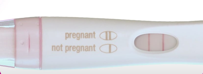 Up close photo of positive pregnancy test result