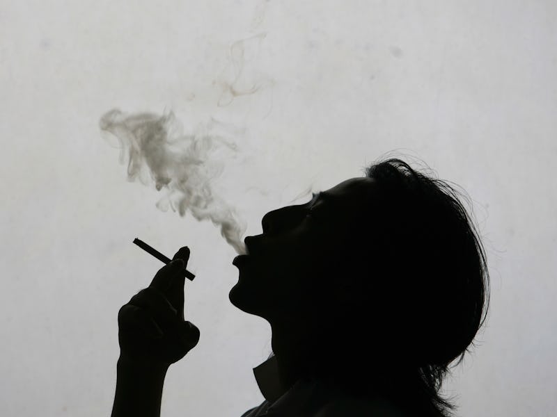 person smokes