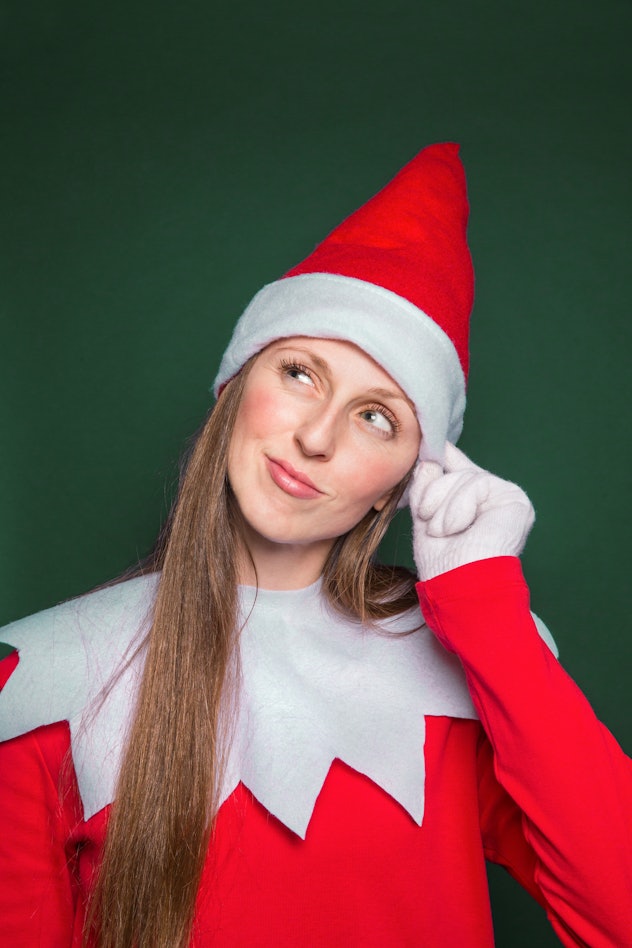 Woman dressed up as Elf on the Shelf