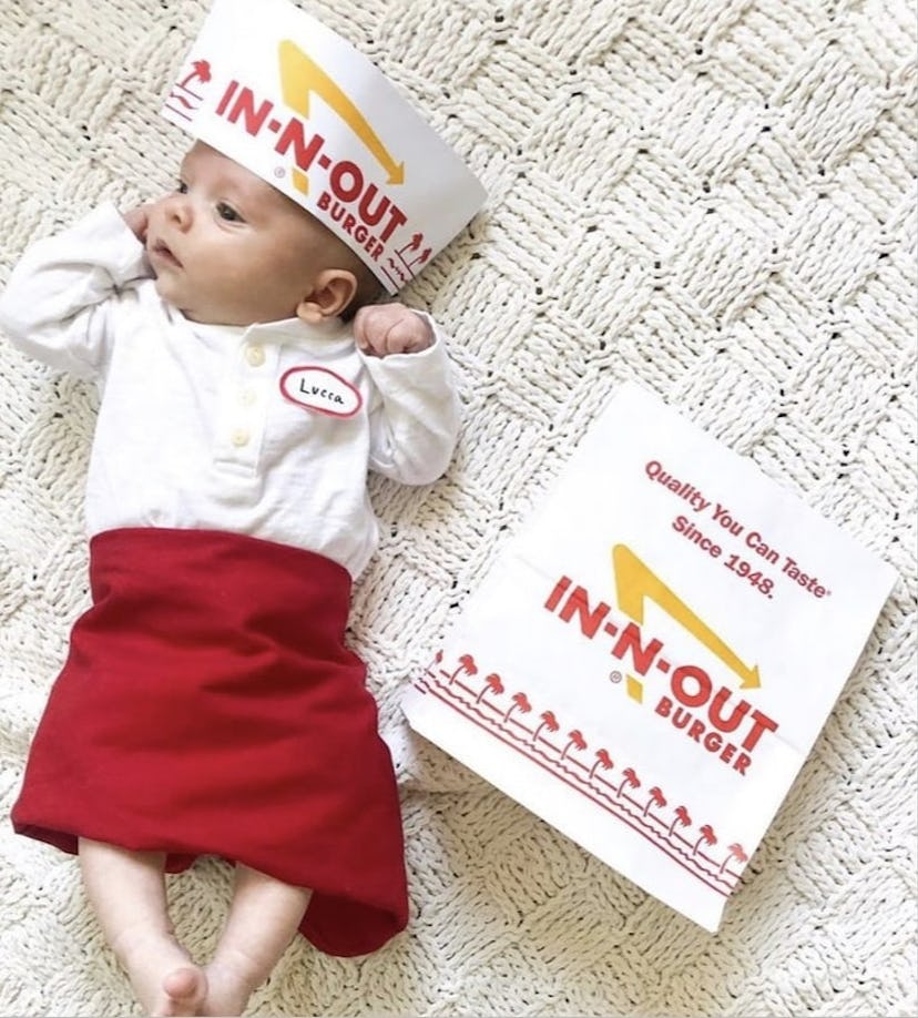 baby dressed for Halloween as an In-N-Out employee, in apron and hat