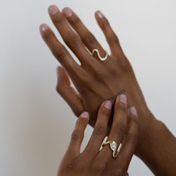 Model wears two rings from KatKim's Trace Ring collection on Instagram, August 25, 2021.