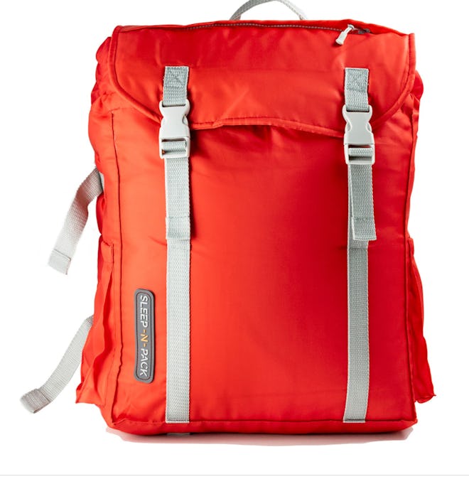 Image of a red kids' backpack that doubles as a roll-out sleeping bag.