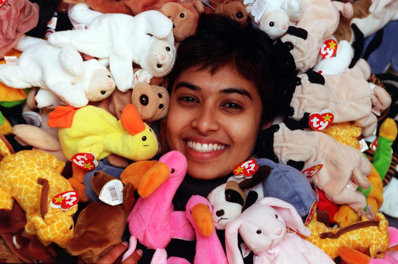 Nawshika Ganegama in a pile of Beanie Babies.