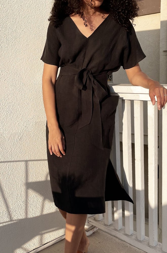 black wrap dress from Two Days Off, a sustainable clothing brand