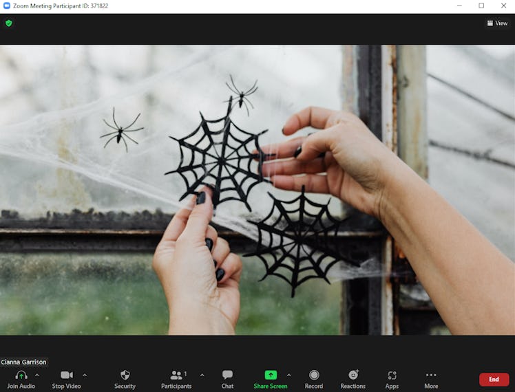 These Halloween Zoom backgrounds feature creepy cobwebs.