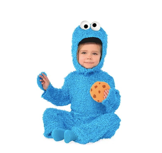 Baby wearing Cookie Monster costume
