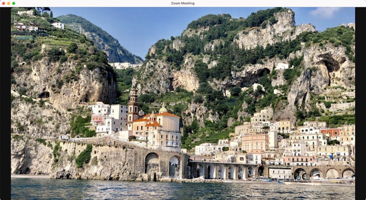 The beach Zoom background features the Amalfi Coast in Italy. 