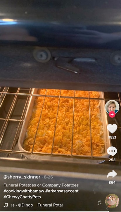 A woman bakes a version of TikTok's viral funeral potatoes recipe while showing users how to make it...