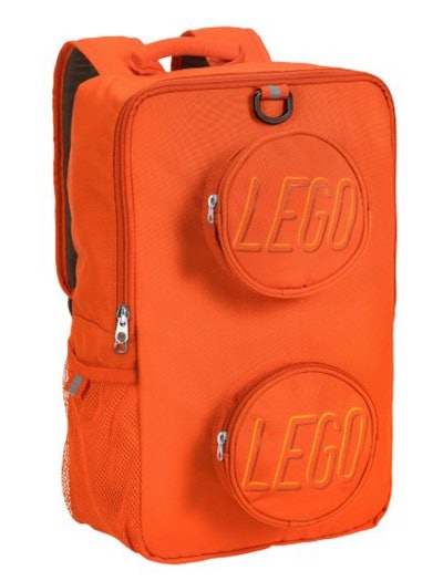 Image of a kid's backpack, designed to look like an orange Lego brick.