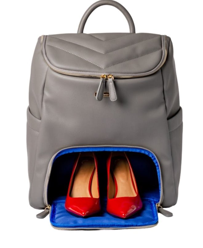 Image of gray backpack with front zippered compartment for holding a pair of shoes.