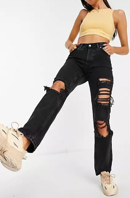 ASOS DESIGN organic mid rise '90s' straight leg jeans in washed black with extreme rips