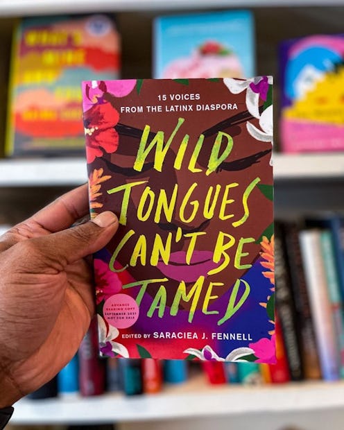 Photo of "Wild Tongues Can't Be Tamed" edited by Saraciea J. Fennell, which is one of Cafe Con Libro...