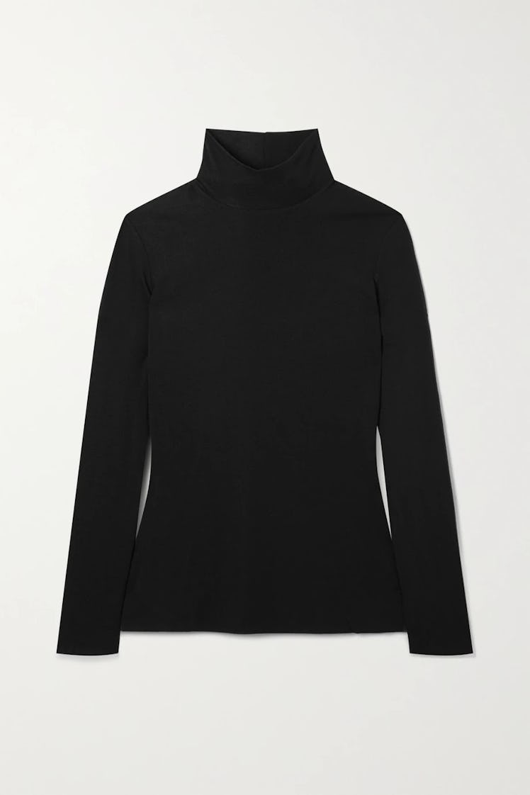 The Row's black turtleneck sweater. 