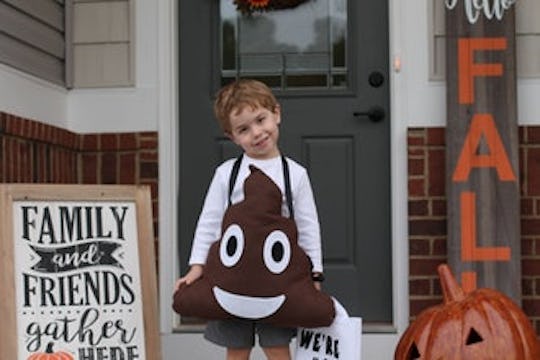kid in poop emoji halloween costume