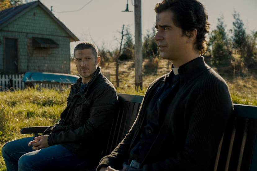 ZACH GILFORD as RILEY FLYNN and HAMISH LINKLATER as FATHER PAUL in episode 102 of 'MIDNIGHT MASS.'