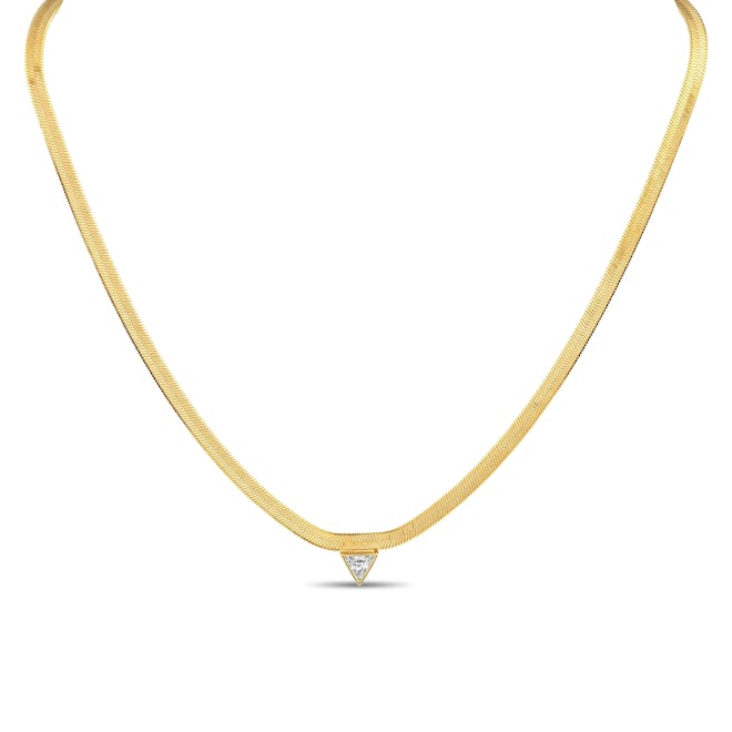 XIO By Ylette's gold creatrix necklace. 