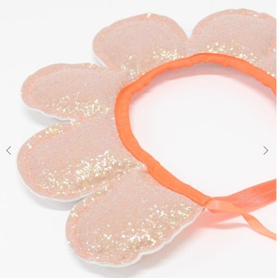 Image of a flower headband with face-framing padded petals.