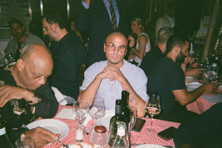 Raul Lopez sitting at a dinner served table
