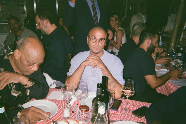 Raul Lopez sitting at a dinner served table