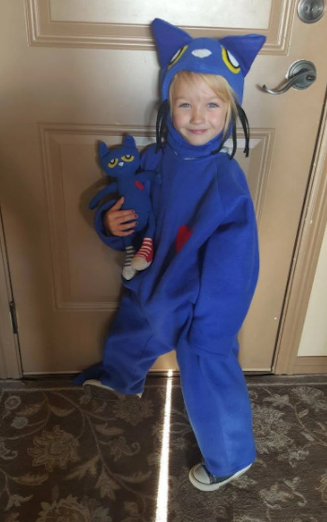 Little girl dressed in Pete the Cat costume