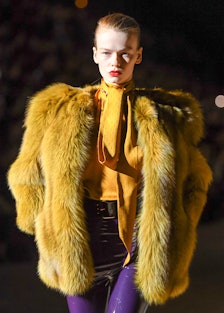  model walks the runway during the Saint Laurent show as part of the Paris Fashion Week Womenswear F...