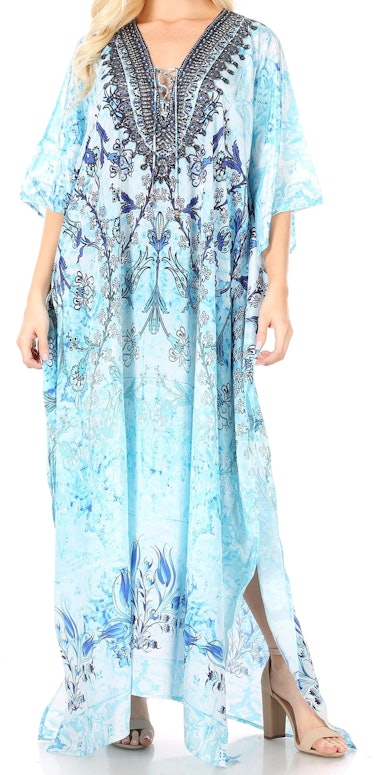 Rachel on 'The White Lotus' wears a light blue caftan.