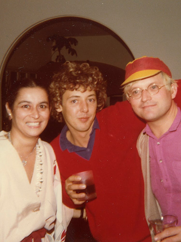 Quinn with Gregory Evans (center) and David Hockney at the Quinns’ home, 1979.