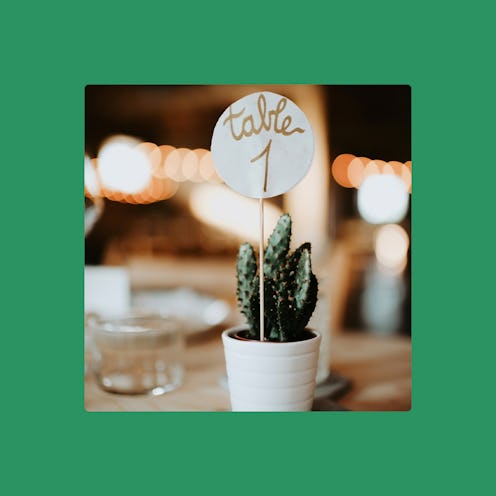 Seating arrangement label on a table at a wedding venue