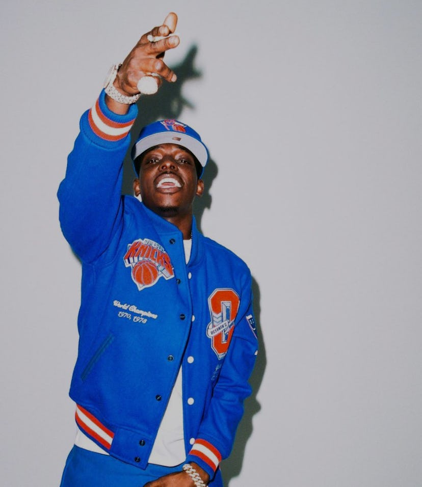 October's Very Own (OVO) NBA New York Knicks collaboration modeled by rapper Bobby Shmurda