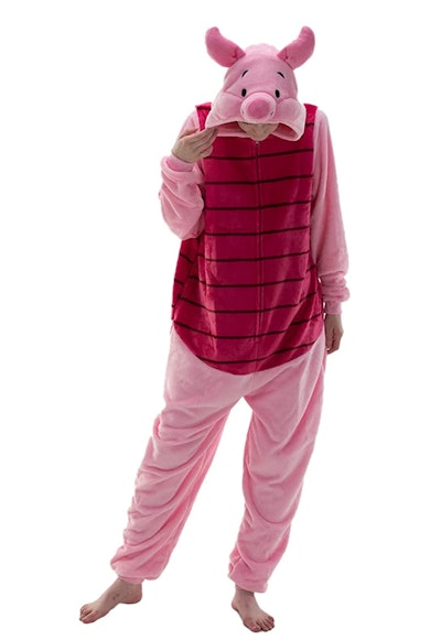 Adult wearing Piglet onesie