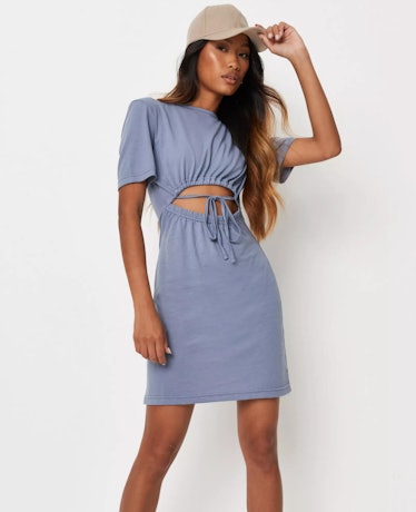 Olivia wears a light blue dress with cutouts on 'The White Lotus.'