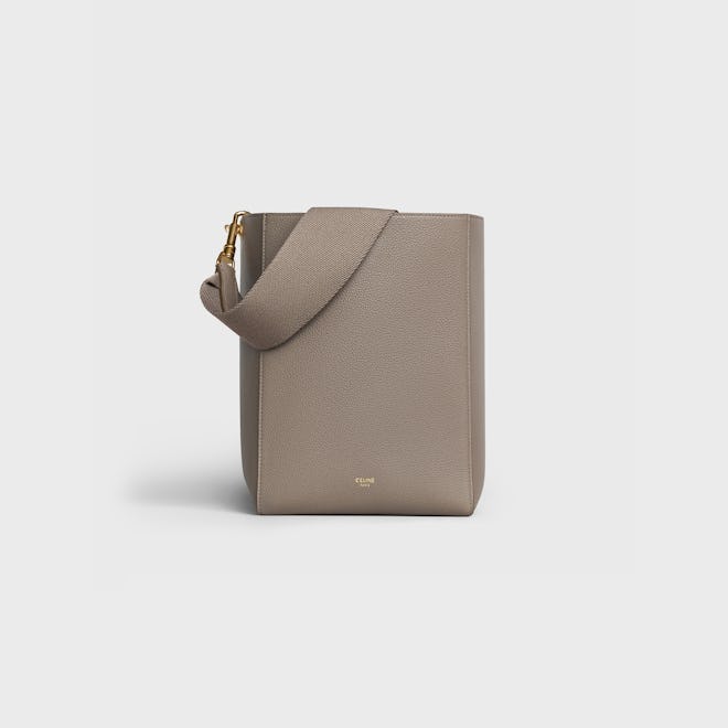 Celine's small Sangle bucket bag in color Taupe.