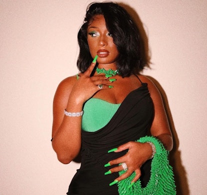 Megan Thee Stallion with long green nails