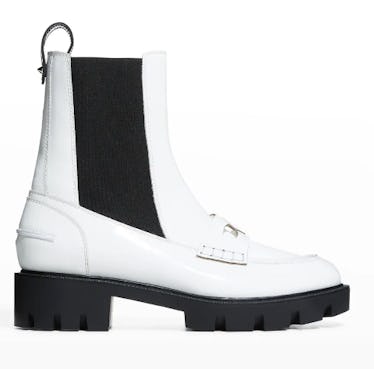 Christian Louboutin's white chelsea loafer boots.