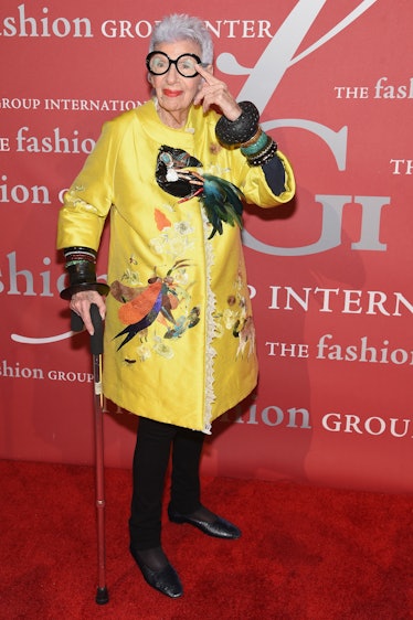 Iris Apfel wearing bright yellow