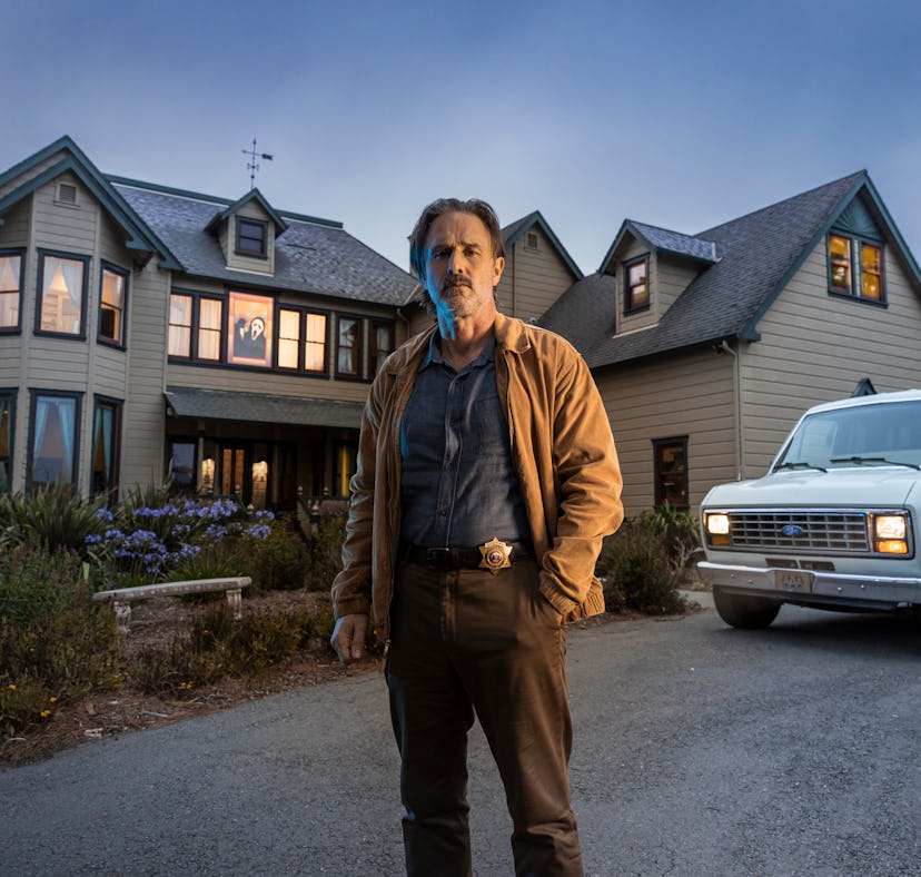David Arquette who plays sheriff Dewey Riley in 'Scream' stands in front of the original 'Scream' ho...