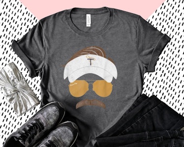 This shirt with Ted Lasso's face on it is just one of many 'Ted Lasso' shirts on Etsy.