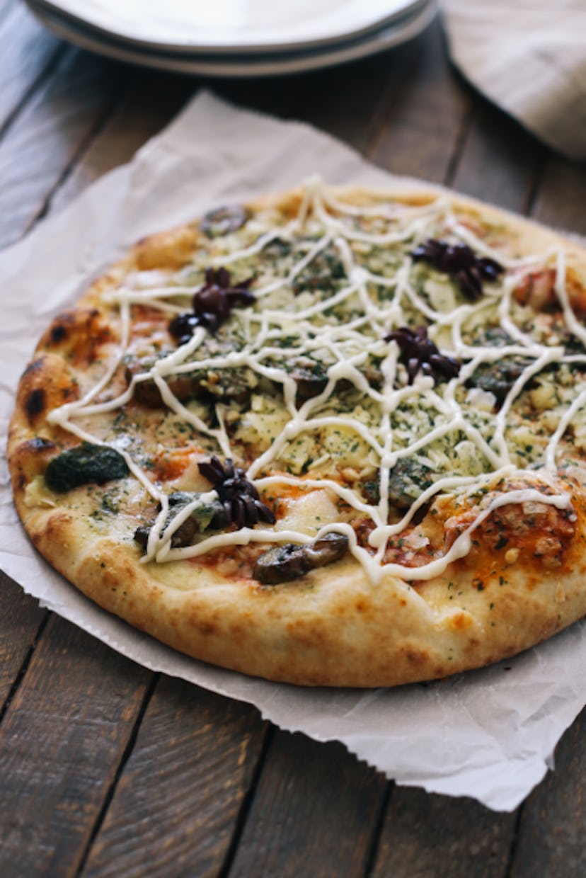 A spiderweb pizza is one Halloween pizza idea to try.