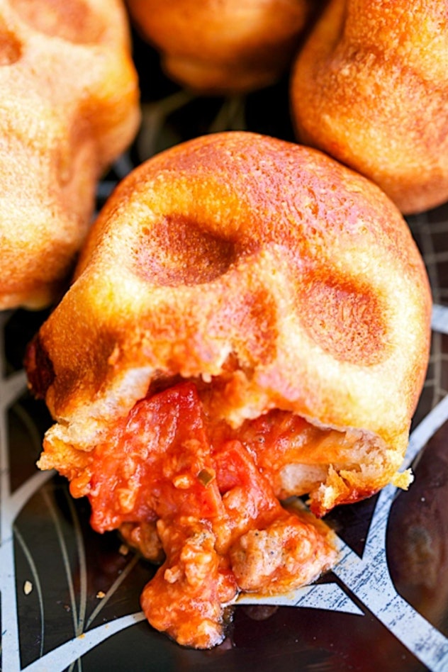Pizza skulls is one Halloween pizza idea to try.