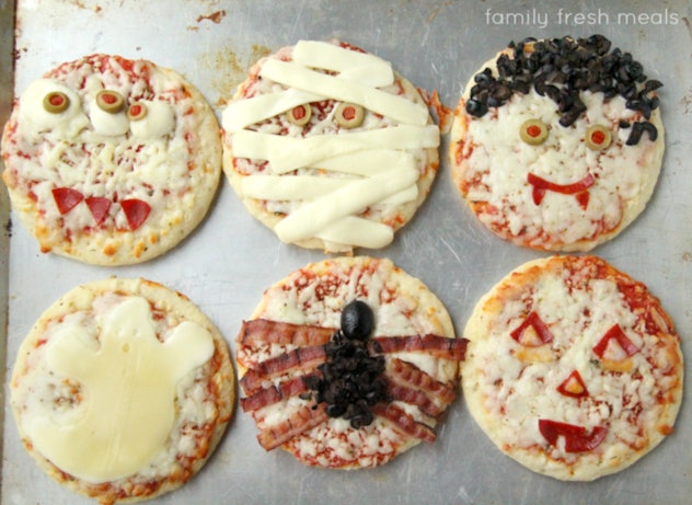 Personalized pizzas with spiders and jack-o-lanterns are some Halloween pizza ideas.